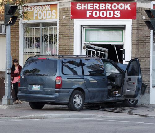 With video- several wittneses were on scene -Single vehicle MVC van into a building on Ellice Ave at Sherbrook  sent three people to hospital , the driver and two children were the only occupants of the  vanÄì 5:50am , the building struck was Sherbrook Foods ,there are no skid marks at the scene  and airbags were deployed . KEN GIGLIOTTI / JUNE 2013 / WINNIPEG FREE PRESS