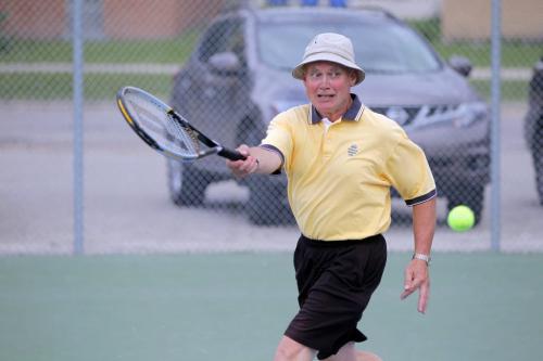 Ron Peterson enjoys his retirement on the tennis courts at Norwood Community Centre. He plays several times a week with some old friends. BORIS MINKEVICH / WINNIPEG FREE PRESS. June 18, 2013