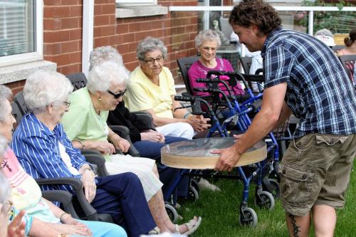 Chris Scholl teaches a drumming class to a group of seniors at the Lindenwood Manor. 130618 June 18, 2013 Mike Deal / Winnipeg Free Press
