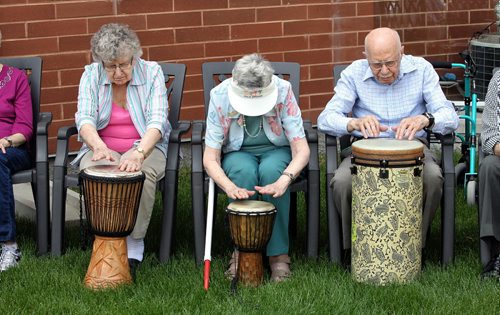 Marjorie, Helen and Peter practice while Chris Scholl teaches a drumming class to a group of seniors at the Lindenwood Manor. 130618 June 18, 2013 Mike Deal / Winnipeg Free Press
