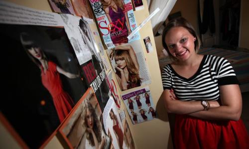 Danielle Mymko, a Taylor Swift "Superfan" poses in her bedroom with some of her TS "stuff". See Carolyn Vesely story. June 18, 2013 - (Phil Hossack / Winnipeg Free Press)