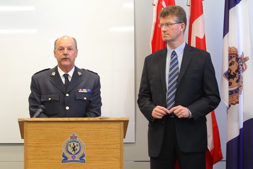 Brandon Sun 19062013 Brandon Police Service Chief Ian Grant speaks at a press conference with Justice Minister Ian Grant at BPS Headquarters regarding the criminal property forfeiture fund grants on Wednesday. (Tim Smith/Brandon Sun)