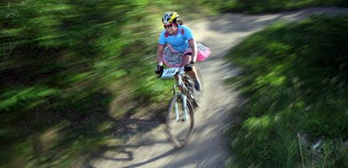 On the hunt,  Melanie LeCalaire works the trails at the "Dirt Skirt" Mountain Bike Race race at Bird's Hill Park Wednesday evening. She was also a "contender" in the pre-race best skirt award contest with her pink trimmed tutu. See Kyle Jahns story. Jume 19, 2013 - (Phil Hossack / Winnipeg Free Press)