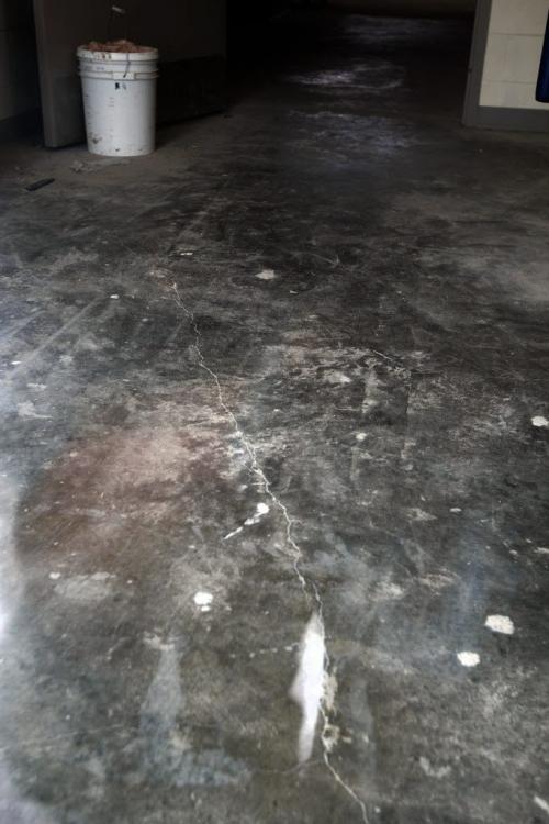 Hairline crack inside  stairwell  - Cracks  have been found in the concrete floors and sidewalks at Investor's Group Stadium  KEN GIGLIOTTI / JUNE 20 130613 / WINNIPEG FREE PRESS