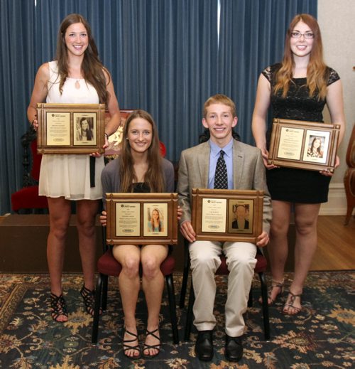 Four Credit Unions High School Athlete Awards were presented by the Lieutenant Governor of Manitoba, Philip Lee, to graduating high school student athletes who maintained a minimum 85% average and compete in at least two interscholastic sports. (Left to right) Brianna Solberg (Miles Macdonell Collegiate), Stefanie Lasuik (Warren Collegiate), Sam Murphy (Vincent Massey Collegiate) and Christina Posthumus (Kildonan East Collegiate). The awards ceremony was held at Government House on Thursday, June 20, 2013. (GARY LAWLESS) (JESSICA BURTNICK/WINNIPEG FREE PRESS)