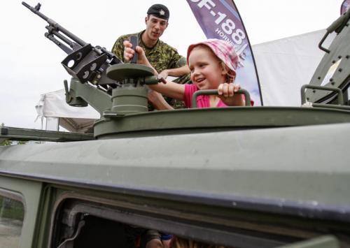 The Canadian Forces display at the Red River Exhibition attracted a number of young people on Thursday, June 20, 2013. According to naval Chief Joanne Legge, the display is intended as an educational tool moreso than a recruiting effort. (ELIZABETH FRASER) (JESSICA BURTNICK/WINNIPEG FREE PRESS)