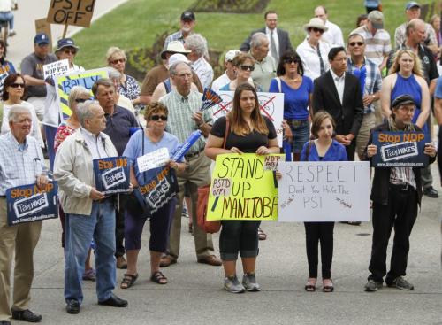 A peaceful rally protesting the upcoming PST hike took place in front of the Legislature on Thursday, June 20, 2013. Around 150 people attended the rally, which was organized by the Tories. (LARRY KUSCH) (JESSICA BURTNICK/WINNIPEG FREE PRESS)