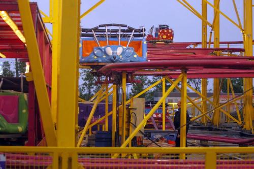 A boy was rushed to hospital after being accidently struck by a ride at the Red River Exhibition early Thursday evening. The accident took place at about 6:15 p.m. A witness to the event said she saw the boy, who she estimated was about 12 years old, run onto the track of the Crazy Mouse roller-coaster after he dropped his hat. He was likely trying to retrieve it, said Uma Jacoby, 13. Uma said one of the Crazy Mouse's cars hit the boy, who was left unconscious and later attended to by paramedics. June 20 2013. BORIS MINKEVICH / WINNIPEG FREE PRESS