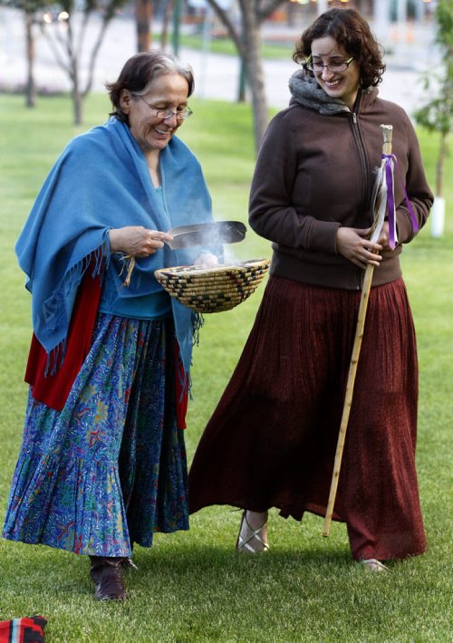 STDUP-In pic left  aboriginal elder Ivy Chaske  and Samantha Kornelsen walks with smudge  , to offer its clensing properties to the mind and body at a 5am  ceriemony  at Memorila Park- Aboriginal elder Calvin Pompana preformed the ancient pipe ceremony with Brian Rice  UofW Associate professor  of aboriginal studies.  A small group  attended the Summer Solstice sunrise ceremony at Memorial Park at  5am  celebration  of  the first World Peace and Prayer Day  other events  with include a bag pipe  ceremony , Aboriginal Day  and Pow Wow  , and Forks to Memorial Park ,  horse ceremony and parade   at 2pm KEN GIGLIOTTI / JUNE 21 2013 / WINNIPEG FREE PRESS