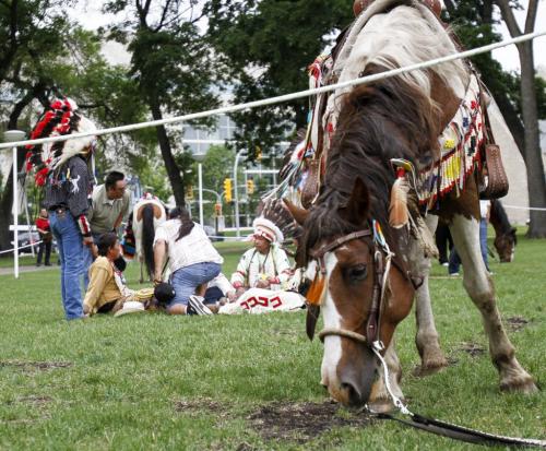 The Dakota Nation Unity Riders rode on horseback from The Forks to Memorial Park on Friday, June 21, 2013 -- also Aboriginal Day -- where they held a traditional Dakota horse ceremony for the public. (JESSICA BURTNICK/WINNIPEG FREE PRESS)
