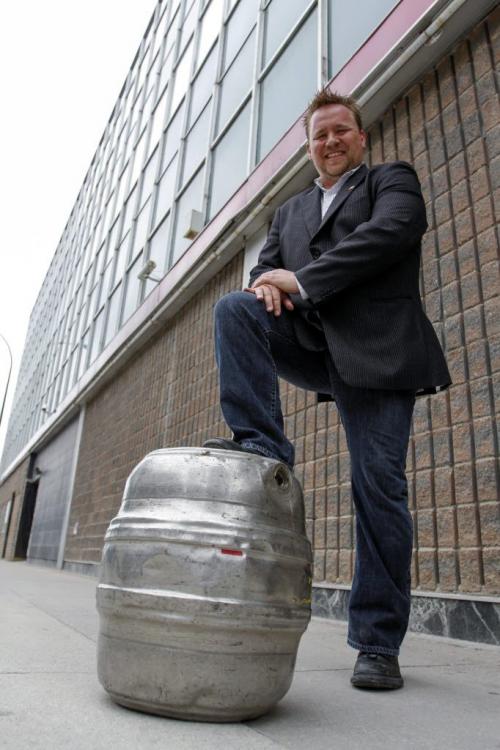 It may not look like much now, but Darren Wanless is aiming to open Portage Ave BrewWorks & Kitchen by Dec. 1 at the site of the former 4-Play Sports Bar at 323 Portage Ave. Friday, June 21, 2013. (GEOFF KIRBYSON) (JESSICA BURTNICK/WINNIPEG FREE PRESS)