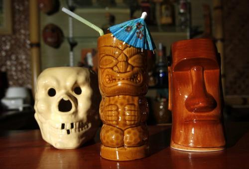 49/8 - INTERSECTIONRon Kerr and his wife Lesley have converted their garage into a full-fledged Tiki lounge. These are a few of their mugs. Dave Sanderson story. (WAYNE GLOWACKI/WINNIPEG FREE PRESS) Winnipeg Free Press June 21 2013