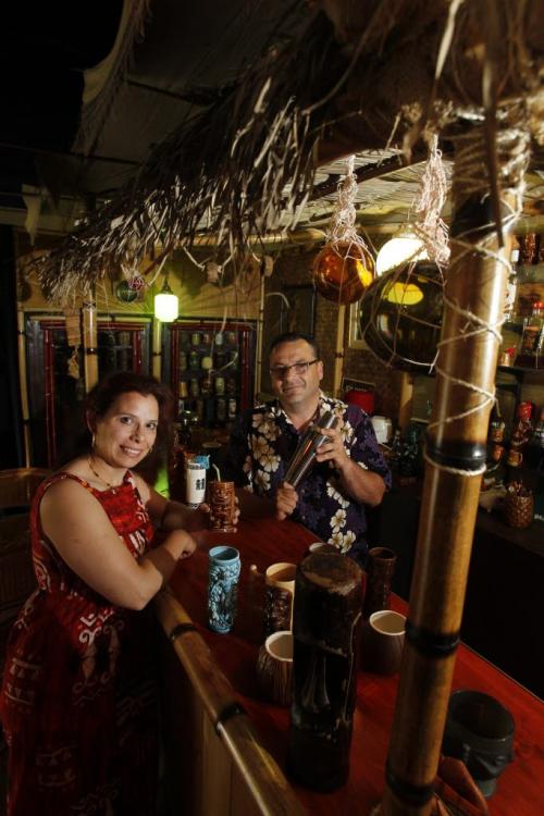 49/8 - INTERSECTIONRon Kerr and his wife Lesley have converted their garage into a full-fledged Tiki lounge. Dave Sanderson story. (WAYNE GLOWACKI/WINNIPEG FREE PRESS) Winnipeg Free Press June 21 2013
