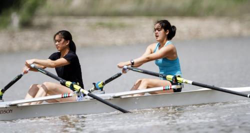 Canada Summer Games hopefuls Hanika Nakagawa (right), 16, and Jaime Wong, 17, take a boat out for a row on the Red River on Saturday, June 22, 2013. The Winnipeg Rowing Club held an open house from 12-4 p.m. (ALEXANDRA PAUL) (JESSICA BURTNICK/WINNIPEG FREE PRESS)