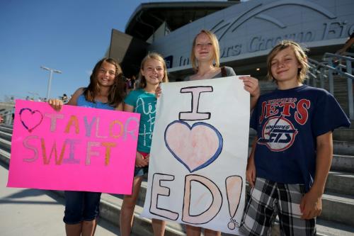 Paige Waldie, 11, Kathleen Fulton, 11, Tekla Cunningham, 13, and Ellis Cunningham, 11, ready for the Taylor Swift concert at Investors Group Field, Saturday, June 22, 2013. (TREVOR HAGAN/WINNIPEG FREE PRESS)