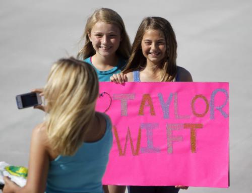 Paige Waldie, 11, Kathleen Fulton, 11, and Paige Waldie, 11, having their picture taken prior to the Taylor Swift concert at Investors Group Field, Saturday, June 22, 2013. (TREVOR HAGAN/WINNIPEG FREE PRESS)