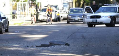 Winnipeg Police have  Wolseley Ave. between Sherbrook St. and Furby St. Monday blocked after an early morning shooting. A lamp fell from a light standard on Wolseley Ave. Adam Wazny story (WAYNE GLOWACKI/WINNIPEG FREE PRESS) Winnipeg Free Press June 24 2013