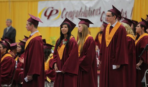 Brandon Sun Students wait for their names to be called to receive their diplomas during Crocus Plains' high school graduation ceremony held at Westman Place on Monday afternoon. (Bruce Bumstead/Brandon Sun)