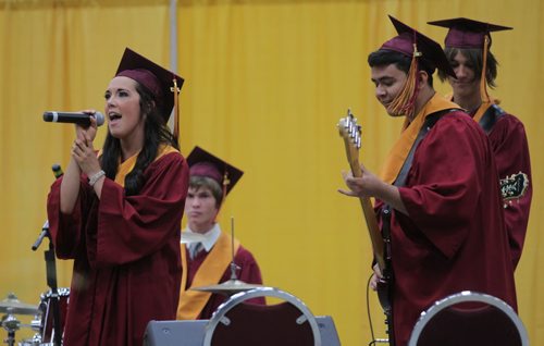 Brandon Sun Jaci Pirie was accompanied by her bandmates and fellow graduates Devin Selinger, Daniel Chavez and Jayson Krahn as their performed Carrie Underwood's "Whenever You Remember", at Monday's graduation ceremony. (Bruce Bumstead/Brandon Sun)