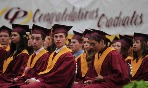 Brandon Sun Students wait for their names to be called to receive their diplomas during Crocus Plains' high school graduation ceremony held at Westman Place on Monday afternoon. (Bruce Bumstead/Brandon Sun)