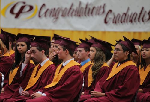 Brandon Sun Students wait for their names to be called to receive their diplomas during Crocus Plains' high school graduation ceremony held at Westman Place on Monday afternoon. (Bruce Bumstead/Brandon Sun)