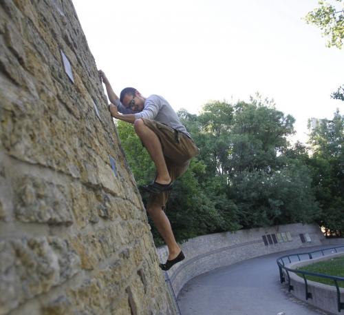 Mike Bileski practicing the athletic activity of parkour at The Forks  on a beautiful Tuesday morning to unwind and for the exercise. The practitioner's goal is to move through their environment using only their bodies and surroundings in a quick and efficient way.   (WAYNE GLOWACKI/WINNIPEG FREE PRESS) Winnipeg Free Press June 25 2013