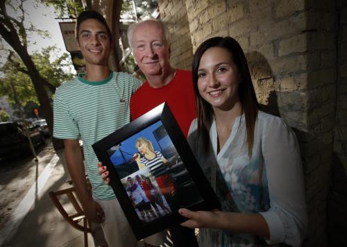 June 24, 2013 - 130624  -  Ray Bernier (M) is photographed with Roxanne Lacroix (R) and Quentin Raval (L) in downtown Winnipeg Tuesday, June 25, 2013. Bernier gave the couple tickets to the Taylor Swift concert. John Woods / Winnipeg Free Press