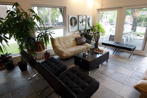 livingroom opens to outdoor patio-Homes -750 Hugo St  , Altro Condos  by Ernie Walter  - todd lewys story-  KEN GIGLIOTTI / JUNE 27 2013 / WINNIPEG FREE PRESS
