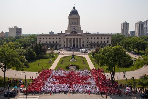 Ron Gilfillan / Winnipeg Downtown BIZ Though the exact number is to be determined offically this year's Living Flag drew over 3000 vollunteers according to Jason Syvixay, a spokesperson at the Winnipeg Downtown BIZ. The event is in it's third year in Winnipeg and drew large croweds to the grounds of the Manitoba Legislature on the Canada Day long weekend.