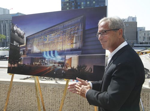 Bob Silver, incoming Chair of the Board of the RBC Convention Centre helped unveil the look of the RBC Convention Centre at the new naming announcement Monday morning. In back is the lot where  the convention centre  will be expanding.  Murray McNeil story.   Wayne Glowacki/Winnipeg Free Press July 2 2013