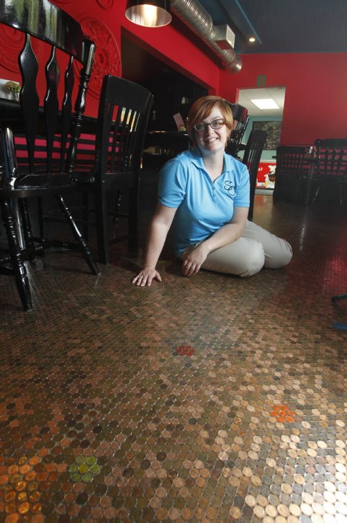 49.8 Intersection. The Summit Café  Stony Mountain  has a floor made up entirely of pennies - 197,000 (and change) in total. Nadine Dannenberg is the owner.  Dave Sanderson story   Wayne Glowacki/Winnipeg Free Press July 5 2013