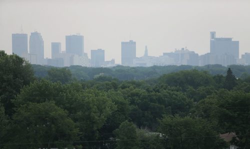 A hazy view towards downtown from Garbage Hill, Saturday, July 06, 2013. (TREVOR HAGAN/WINNIPEG FREE PRESS)