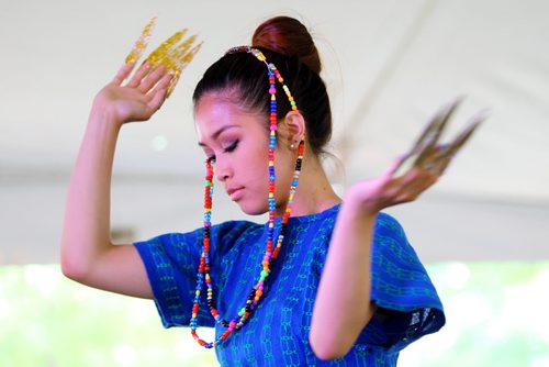 Brandon Sun 06072013 Lianne Cunanan with the Westman Filipino Dancers performs during the second day of the Brandon Multicultural Summer Festival at Princess Park on Saturday. (Tim Smith/Brandon Sun)