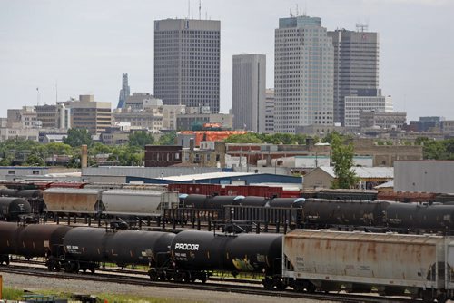 Pic for story to illustrate the movement of hazardous material through Wpg Äì chemical cars as well as all  manner of cargo from  grain to  chemicals at the CP Logan Yards  KEN GIGLIOTTI / JULY 8 2013 / WINNIPEG FREE PRES