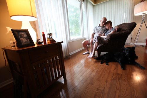 Winnipeg Free Press columnist Lindor Reynolds shares a tender moment with her husband Neil at their home after recently being diagnosed with brain cancer.   See Lindor's column.  July 10, , 2013 Ruth  Bonneville , Winnipeg Free Press