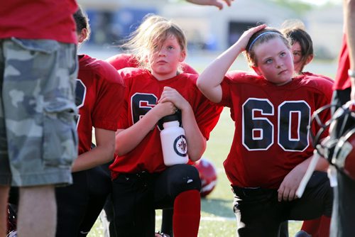 Manitoba Girls Football Association league play between the St. Vital Mustangs and the North Winnipeg Nomads Jr teams. The MGFA is a stand alone program that gives girls that want to play against other girls the oppotunity and still alows the girls that wish to play fall football to do so. #69 Katie Besko, #60 Fiona Shrimpton. BORIS MINKEVICH / WINNIPEG FREE PRESS June 19, 2013