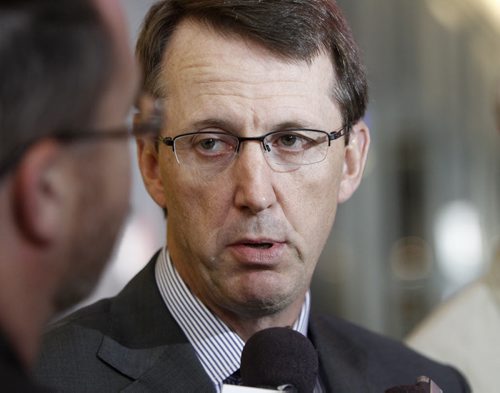 Mark Chipman speaks with media at the funeral for Don Baizley at MTS Centre, Wednesday, July 10, 2013. (TREVOR HAGAN/WINNIPEG FREE PRESS)