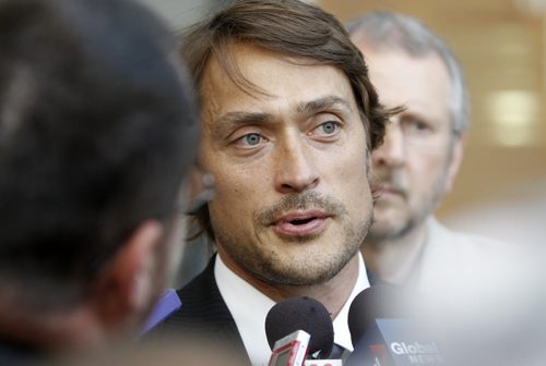 Teemu Selanne speaks with media at the funeral for Don Baizley at MTS Centre, Wednesday, July 10, 2013. (TREVOR HAGAN/WINNIPEG FREE PRESS)