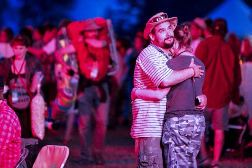 Robert Gaumond and Wenona Babbitt sneak a moment amid the crowd to dance while City and Colour is on the Main Stage at the end of the evening on Day 1 at the Winnipeg Folk Festival. Wednesday, July 10, 2013. (JESSICA BURTNICK/WINNIPEG FREE PRESS)
