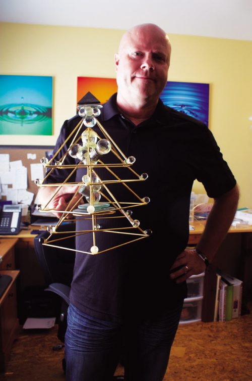 Canstar Community News Chris Kehler is shown with a silverlight pyramid, which he says can affect the actions of spirits. Kehler will present at Winnipeg Paracon from July 12 to 14. (DAN FALLOON/CANSTAR COMMUNITY NEWS)