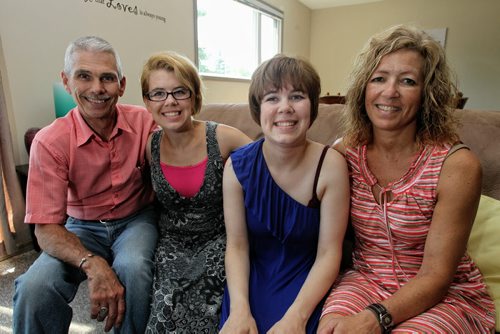 Bob and Karen Webb with their daughters Karly (left) and Courtney at the Pulford Community Living Services house. ItÄôs a housing-day program service for people living with disabilities. 130711 July 11, 2013 Mike Deal / Winnipeg Free Press