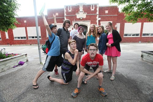 A group of Windsor School students pose for a photo outside their school on their last day.  Names from left to right  - Quinn, Garrett, Julian, Shelby, Hailey, Aby, Sarah, Griffin and Noah (red).  Grade 8 Windsor School students  spend the final moments on the last day of school writing in each others yearbooks, cleaning out lockers and sharing tearful goodbyes as they transition from grade school to High School in the fall of this year.  Some of the students have been attending Windsor School  with the same group of friends since kindergarden. Although most of the students will be going to Glenlawn Collegiate some have plans to attend a different high school.  Photo's taken on June 28, 2013 Class of 2017 Doug Speirs story.  July 11 , 2013 Ruth  Bonneville , Winnipeg Free Press