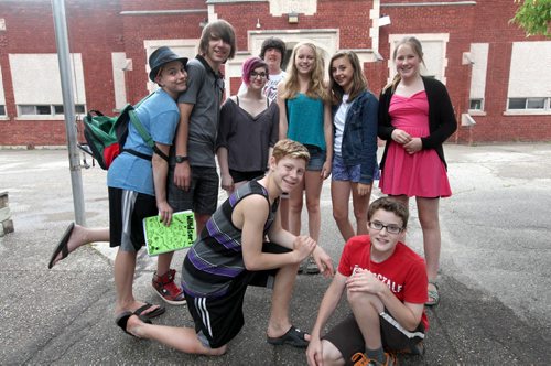 A group of Windsor School students pose for a photo outside their school on their last day.  Names from left to right  - Quinn, Garrett, Julian, Shelby, Hailey, Aby, Sarah, Griffin and Noah (red).  Grade 8 Windsor School students  spend the final moments on the last day of school writing in each others yearbooks, cleaning out lockers and sharing tearful goodbyes as they transition from grade school to High School in the fall of this year.  Some of the students have been attending Windsor School  with the same group of friends since kindergarden. Although most of the students will be going to Glenlawn Collegiate some have plans to attend a different high school.  Photo's taken on June 28, 2013 Class of 2017 Doug Speirs story.  July 11 , 2013 Ruth  Bonneville , Winnipeg Free Press
