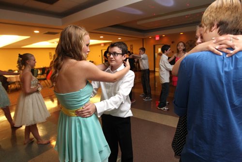 Grade 8 Windsor School students  celebrate the end of their classes at Windsor School  as they move on to high school at  a Farewell dinner and dance party at the end of June 2013.  Most of the students will be attending Glenlawn Collegiate in the fall of this year but some plan on moving to different high schools. Noah dances a slow song with Hailey during a slow song at farewell. Class of 2017 Doug Speirs story.  July 11 , 2013 Ruth  Bonneville , Winnipeg Free Press