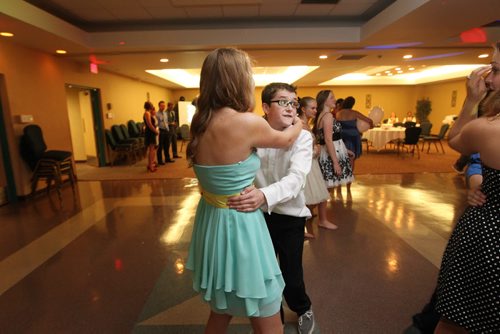 Grade 8 Windsor School students  celebrate the end of their classes at Windsor School  as they move on to high school at  a Farewell dinner and dance party at the end of June 2013.  Most of the students will be attending Glenlawn Collegiate in the fall of this year but some plan on moving to different high schools. Noah dances with Hailey who is much taller than him during a slow song at farewell. Class of 2017 Doug Speirs story.  July 11 , 2013 Ruth  Bonneville , Winnipeg Free Press