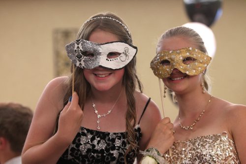 Grade 8 Windsor School students  celebrate the end of their classes at Windsor School  as they move on to high school at  a Farewell dinner and dance party at the end of June 2013.  Most of the students will be attending Glenlawn Collegiate in the fall of this year but some plan on moving to different high schools. Sarah  and Naomi show off their masks during the farewell. Class of 2017 Doug Speirs story.  July 11 , 2013 Ruth  Bonneville , Winnipeg Free Press
