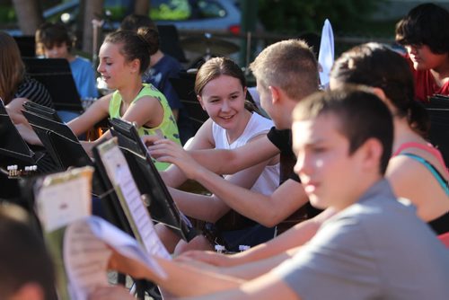 Grade 8 Windsor School band students  perform for parents and teachers outside the school  the last time before they graduate into high school. Sydney (in white) talks to Liam. Class of 2017 Doug Speirs story.  July 11 , 2013 Ruth  Bonneville , Winnipeg Free Press