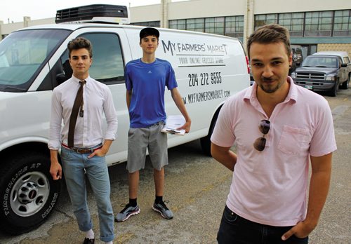 Canstar Community News July 17, 2013 -- Nathan Steele (right), along with brother Josiah Koppanyi (left) and delivery driver Mitch Toews (centre), launched their online grocery store MyFarmersMarket on July 3. MATT PREPROST/CANSTAR COMMUNITY NEWS