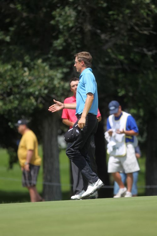 Mackenzie Hughes of Dundas Ontario accepts congrtulations finishing 18 Friday afternoon. See Kyle Jahns story. July 19, 2013 - (Phil Hossack / Winnipeg Free Press)