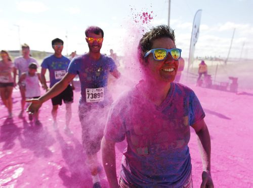 About 13,000 people will participate in the 5km Color Me Rad run at the Red River Ex Grounds today and tomorrow, Saturday, July 20, 2013. (TREVOR HAGAN/WINNIPEG FREE PRESS)